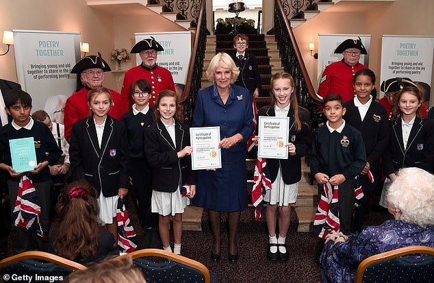 Knightsbridge School children alongside Marlborough Primary children and Chelsea Pensioners being presented their certificate of participation in the event by HRH the Duchess of Cornwall.
