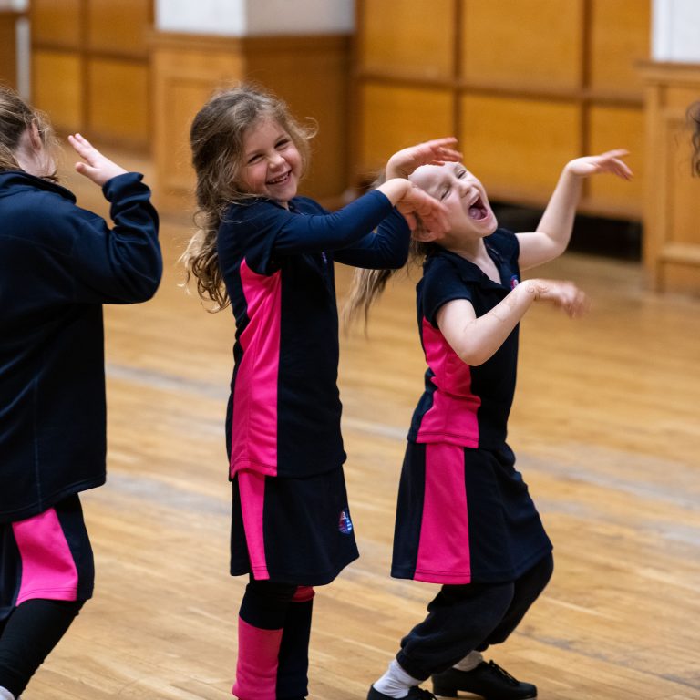 4 young students dancing