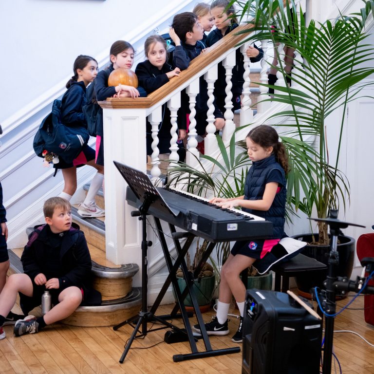 student playing music