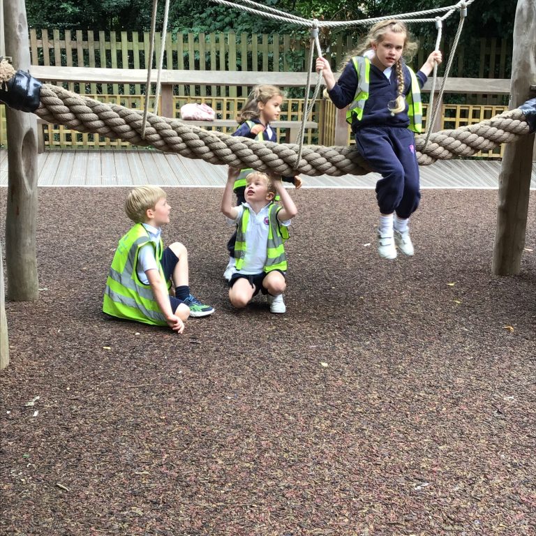 4 students in hi-viz jackets