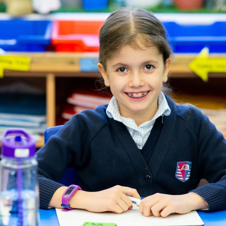 Child sat at the desk
